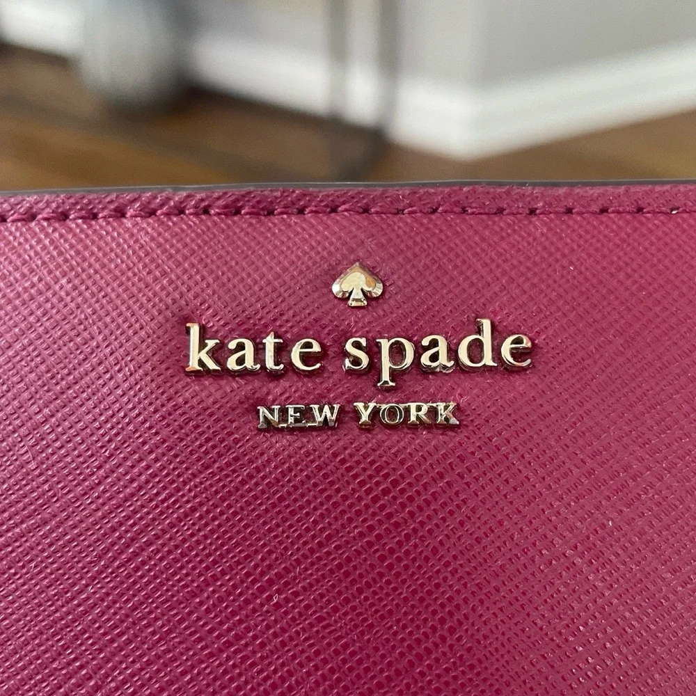Kate Spade Leather Snap Closure Bi-Fold Wallet in Wine Color
